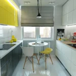 Bright and organized small apartment kitchen with white cabinets and wood accents