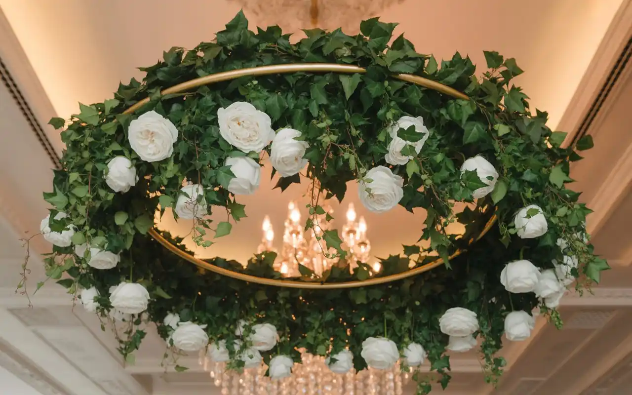 A professional-looking DIY greenery installation with eucalyptus hanging from the ceiling.