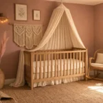 A pink boho nursery with dusty rose walls, macramé wall hanging above the crib, rattan rocking chair, and jute rug
