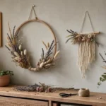 Elegant DIY floral wall hangings on a wall with a dried flower embroidery hoop and macramé piece