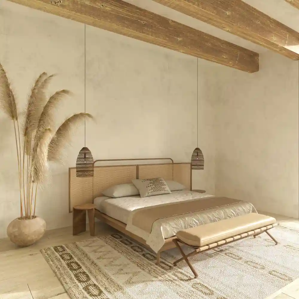 Farmhouse bedroom with warm cream walls, a wood headboard, and a soft 2700K bedside lamp glow
