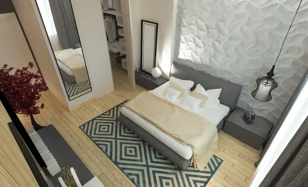 Overhead view of a small bedroom floor plan showing bed placement and clear 30-inch walkways around the bed