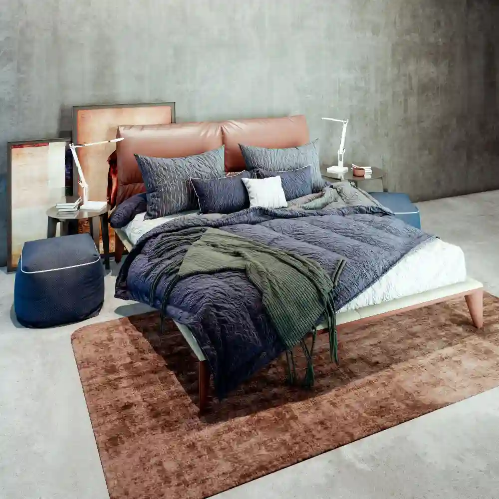 Cozy master bedroom ideas with a soft wool rug under the lower two-thirds of the bed framing the floor