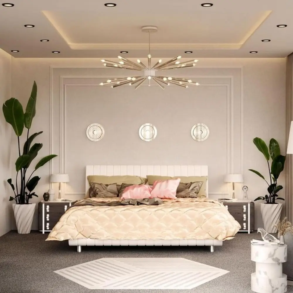Tall cream boucle upholstered headboard framing a layered bed in a warm cozy bedroom