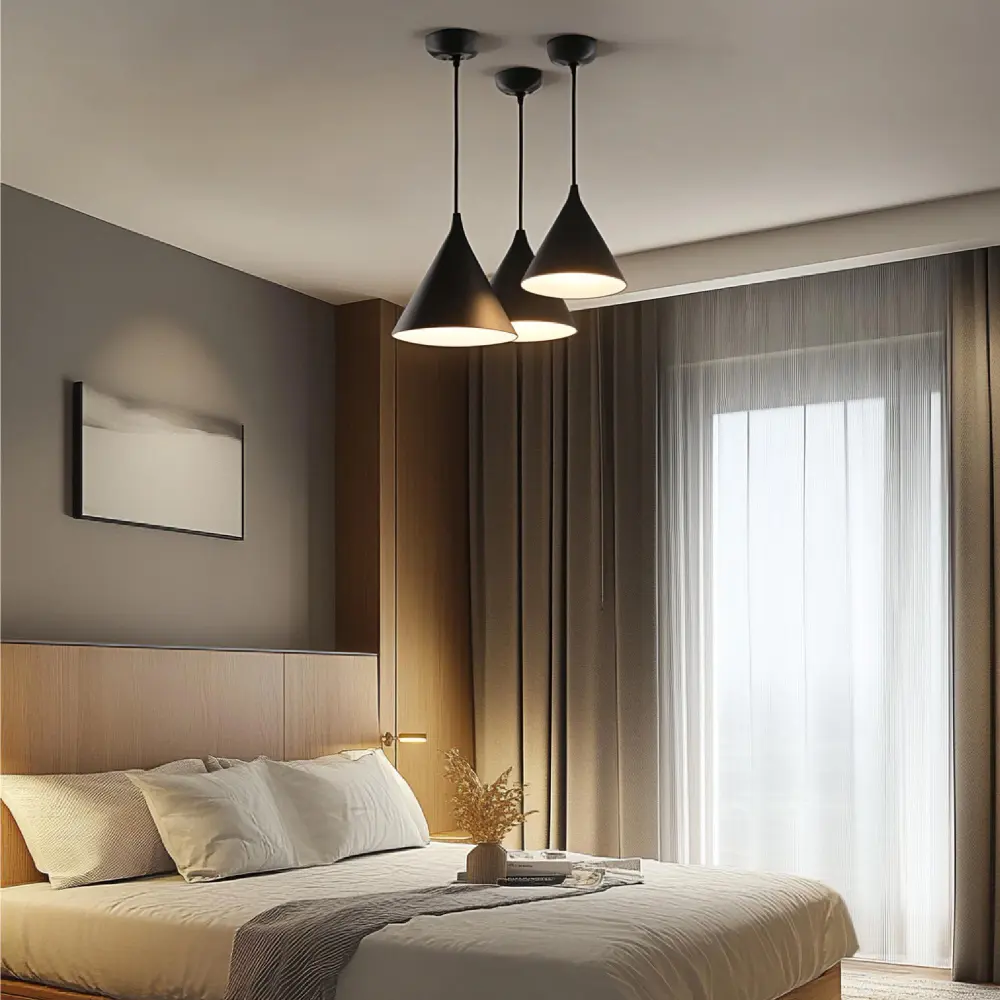 Cozy bedroom at night lit by warm 2700K table lamps and a swing-arm wall sconce