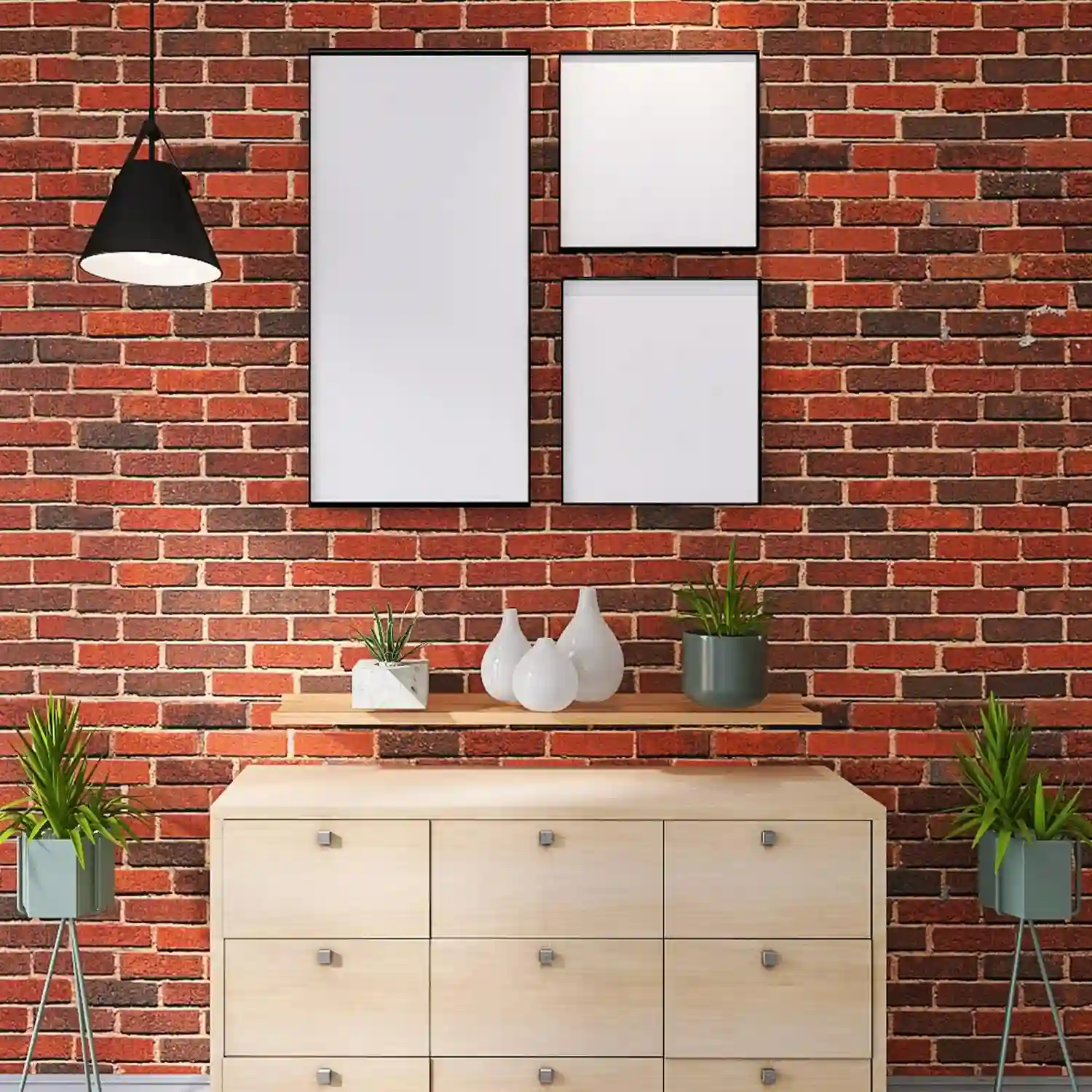 Small bathroom gallery wall of five thin black frames arranged in a grid above a toilet