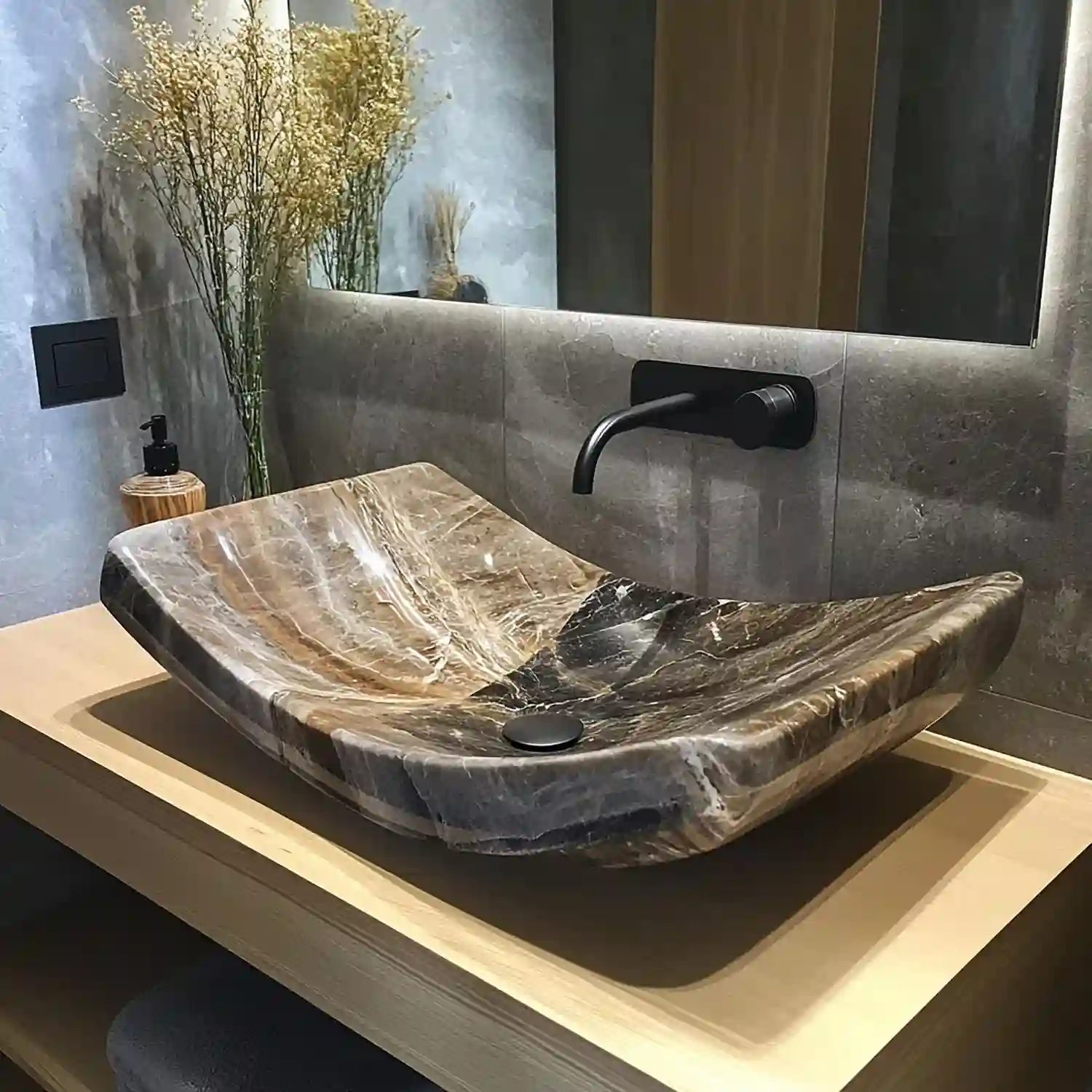 Close-up of a bathroom basin, faucet, and counter with a tape measure, illustrating sink sizing decisions