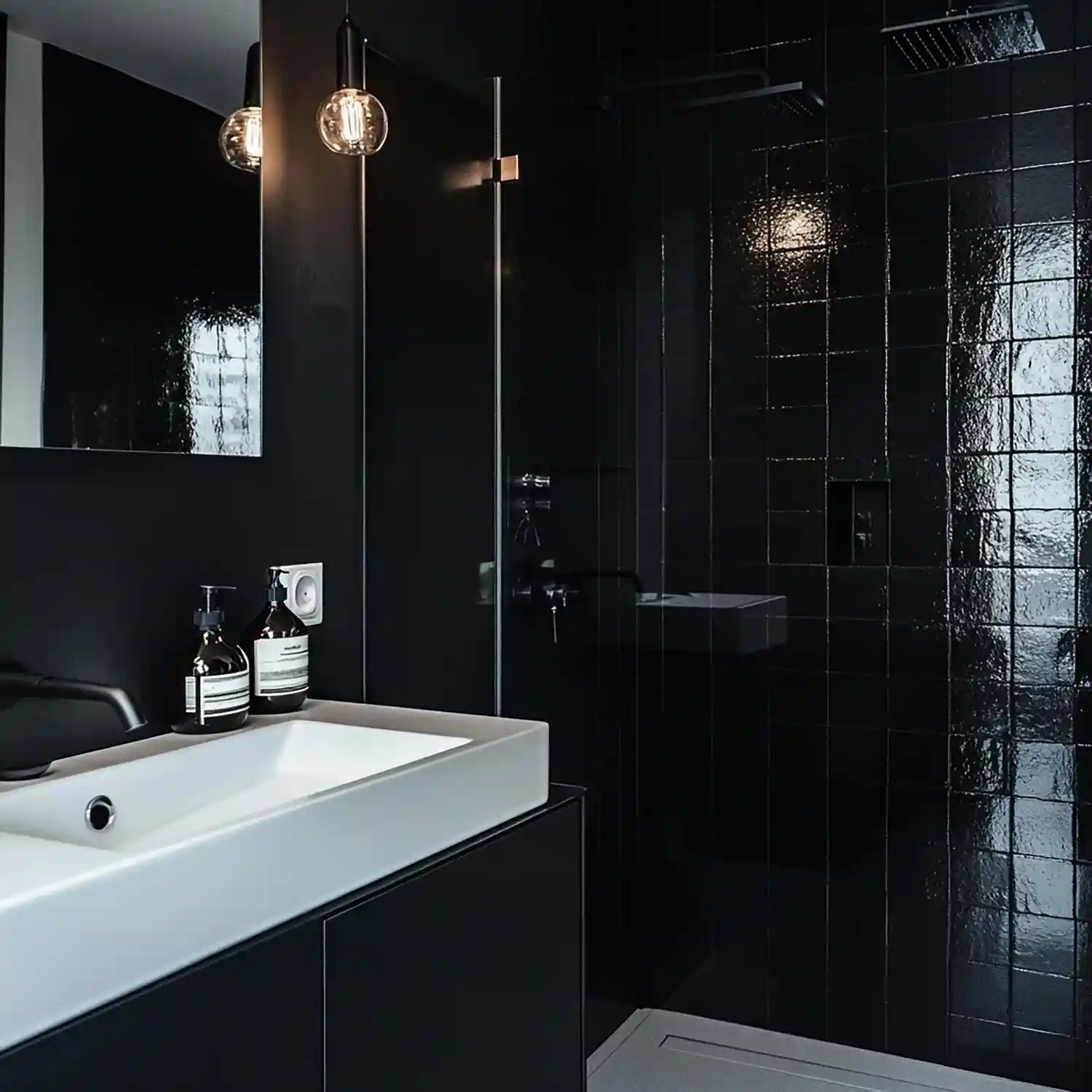 Bathroom with a single black accent wall behind a vanity and lighter surrounding walls
