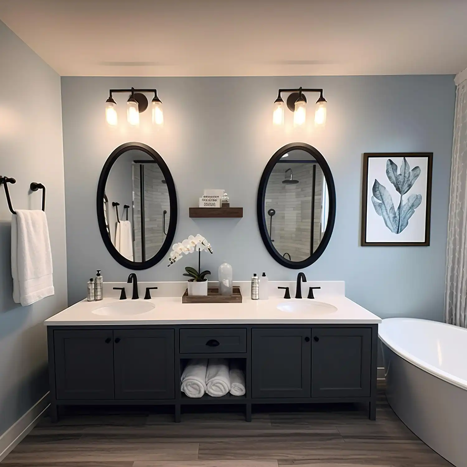 Modern bathroom in a calm warm greige palette with brass hardware and white marble tile