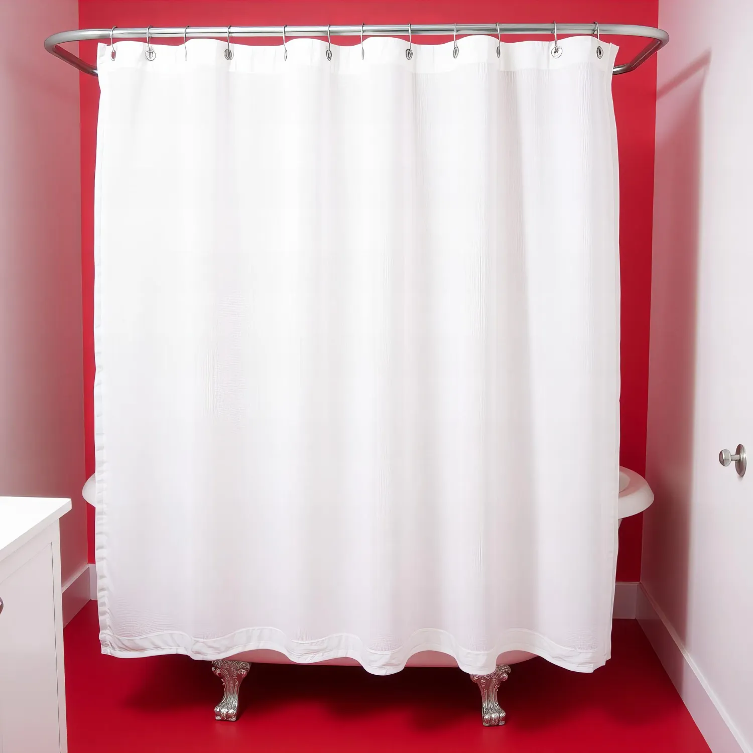 Fabric shower curtain layered over a clear plastic liner on the same rings above a white bathtub